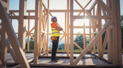 Construction worker viewing project